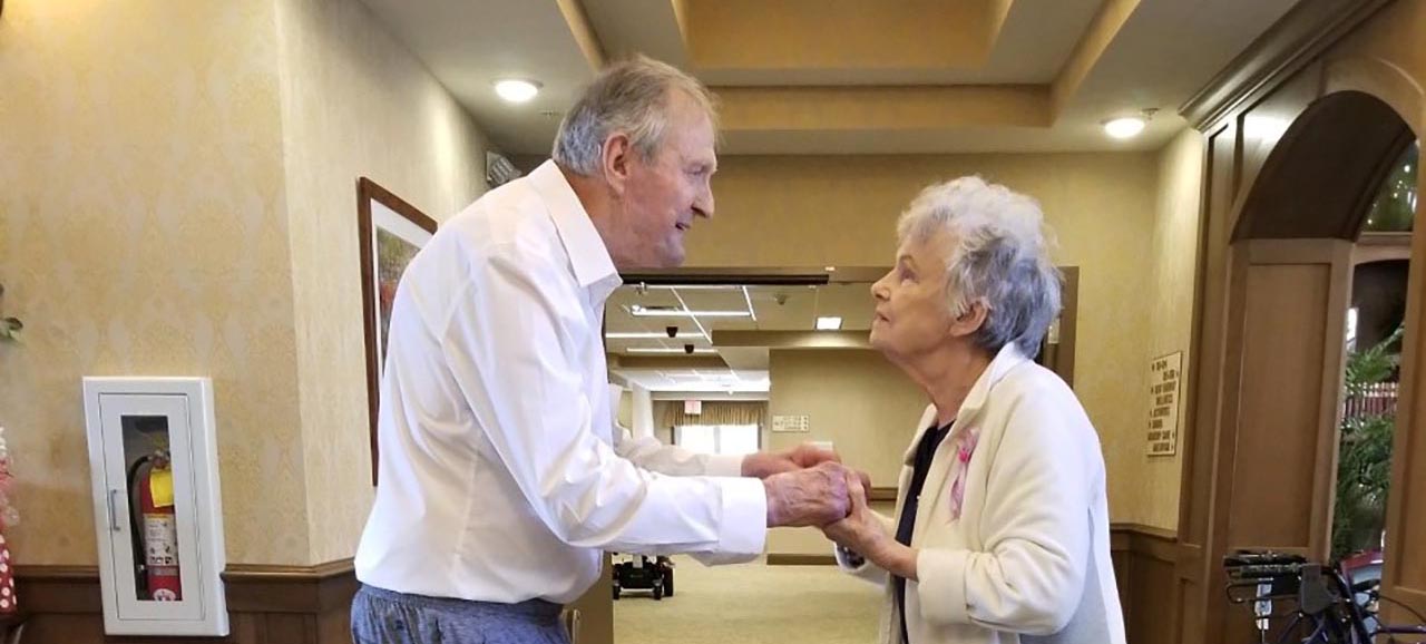 two residents dancing